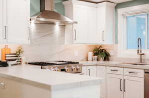 Kitchen showing 36" gas range and main sink