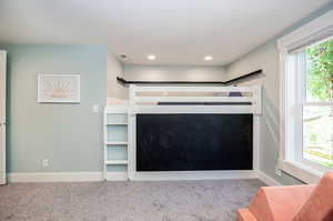 Recreation room with lofted bed space