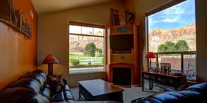 Living room featuring stunning views of Moab Rim!