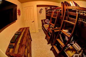 3rd bedroom featuring custom wood bunk beds and dresser