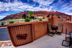 Patio with stunning views of Moab Rim (to the left/east views of La Sal Mountains, not pictured)