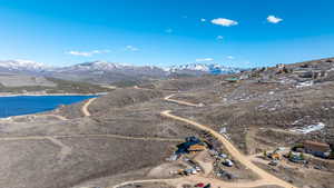 Aerial view with a water and mountain view