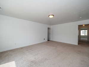 View of carpeted spare room