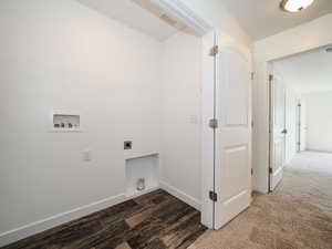 Laundry room featuring hookup for an electric dryer, carpet flooring, and washer hookup