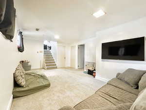 Living room with light colored carpet