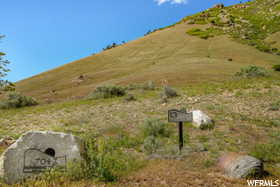 View of mountain feature with a rural view