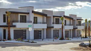 View of property featuring a garage