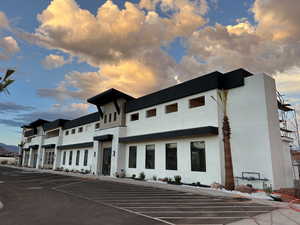 View of outdoor building at dusk