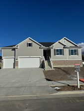 View of front of home featuring a garage