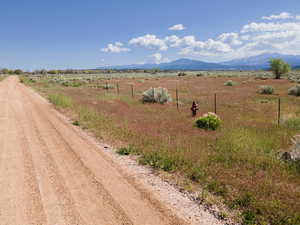 View of road with a rural view and a mountain view