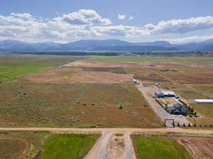 Drone / aerial view with a rural view and a mountain view