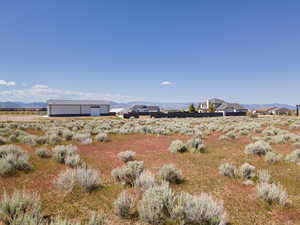 View of yard with a mountain view