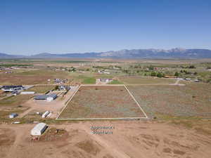 Aerial view with a rural view and a mountain view