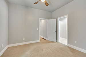 Bedroom one has two doors, one leads to the hallway and one to the front rooms.