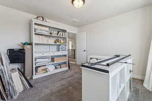 View of carpeted home office