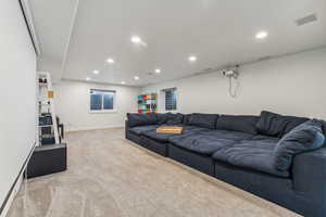 Living room with light colored carpet