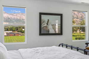 Bedroom featuring multiple windows