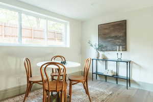 Dining space featuring hardwood / wood-style flooring