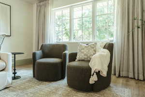 Sitting room featuring wood-type flooring