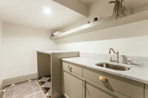 Laundry room featuring sink