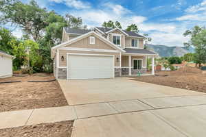 Craftsman house with a mountain view and a porch