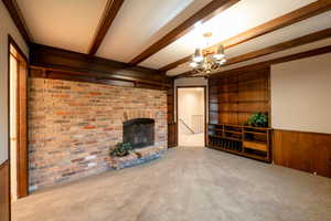 Cozy family room with fireplace and bookshelf