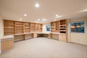 Large spacious bedroom or office with closet and views of sunset to the west