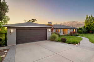 Front of home with mountain view