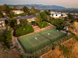 Aerial view of tennis court and home