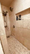 Bathroom with a tile shower