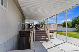 View of patio with a deck