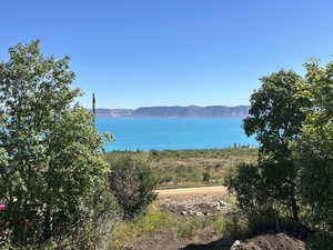 Property view of water with a mountain view