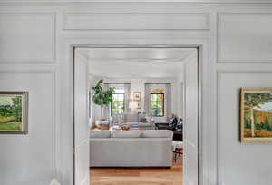 Living room with light hardwood / wood-style flooring