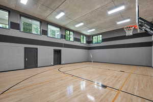 indoor View of sport court featuring a healthy amount of sunlight