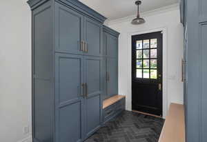 Mudroom with crown molding