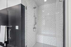 Bathroom featuring walk in shower