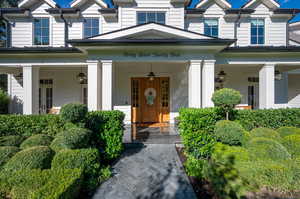 Entrance to property with covered porch