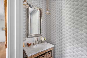 main floor bathroom featuring vanity