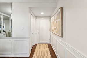 Hallway featuring wood-type flooring