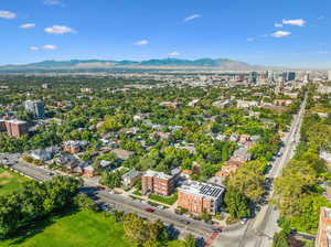 Birds eye view of property with a mountain view