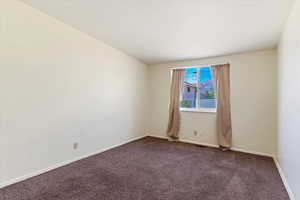 Spare room with carpet flooring