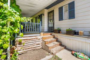 Entrance to property with covered porch