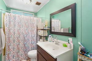 Bathroom with toilet and vanity