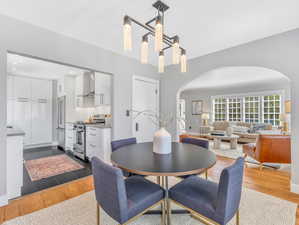 Dining room with light hardwood / wood-style floors