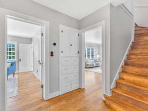 Hallway featuring light wood-type flooring