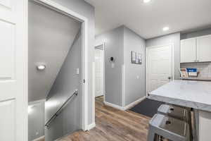 Interior space featuring dark hardwood / wood-style flooring