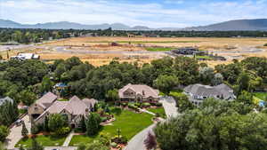 Birds eye view of property featuring a mountain view