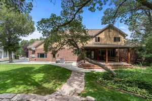 View of front of property with a front lawn