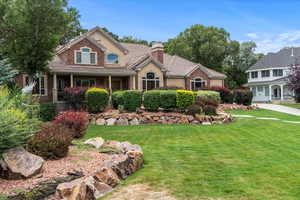 View of front of house featuring a front lawn