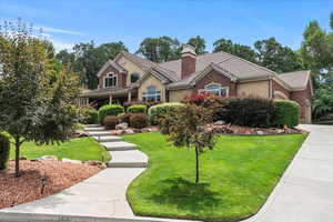 View of front of home with a front lawn